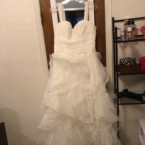 White ruffles size 12 with straps wedding dress.